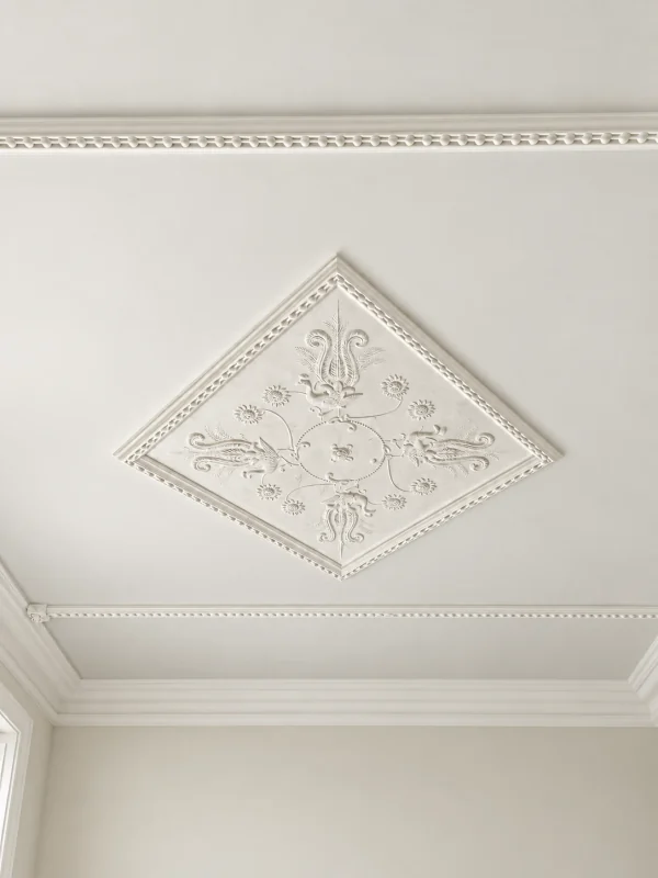 Finish visualisation of a diamond-oriented decorative plaster panel with floral and botanical relief