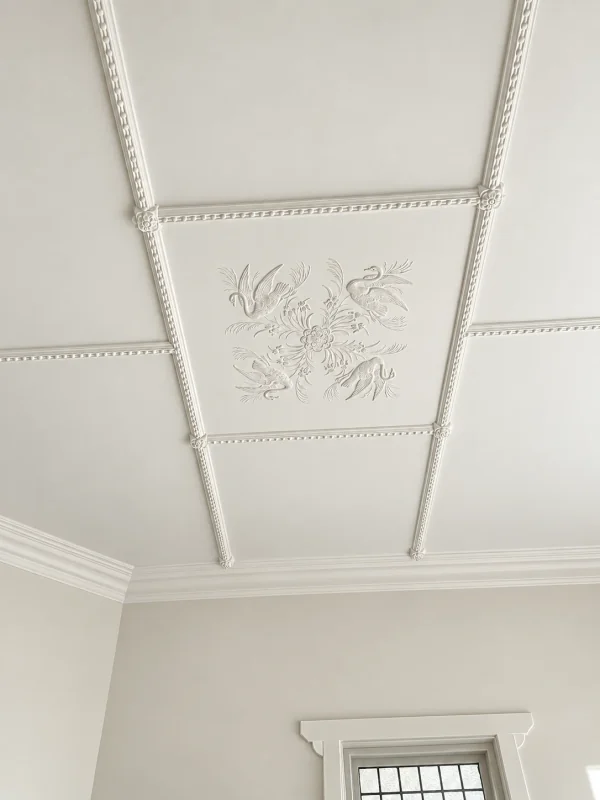 Finish visualisation of a square plaster panel with four swans and a central flower