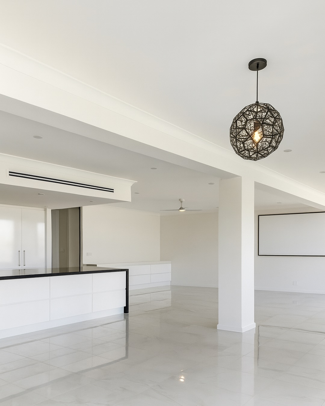 Open-plan living area connected to the renovated North Haven kitchen