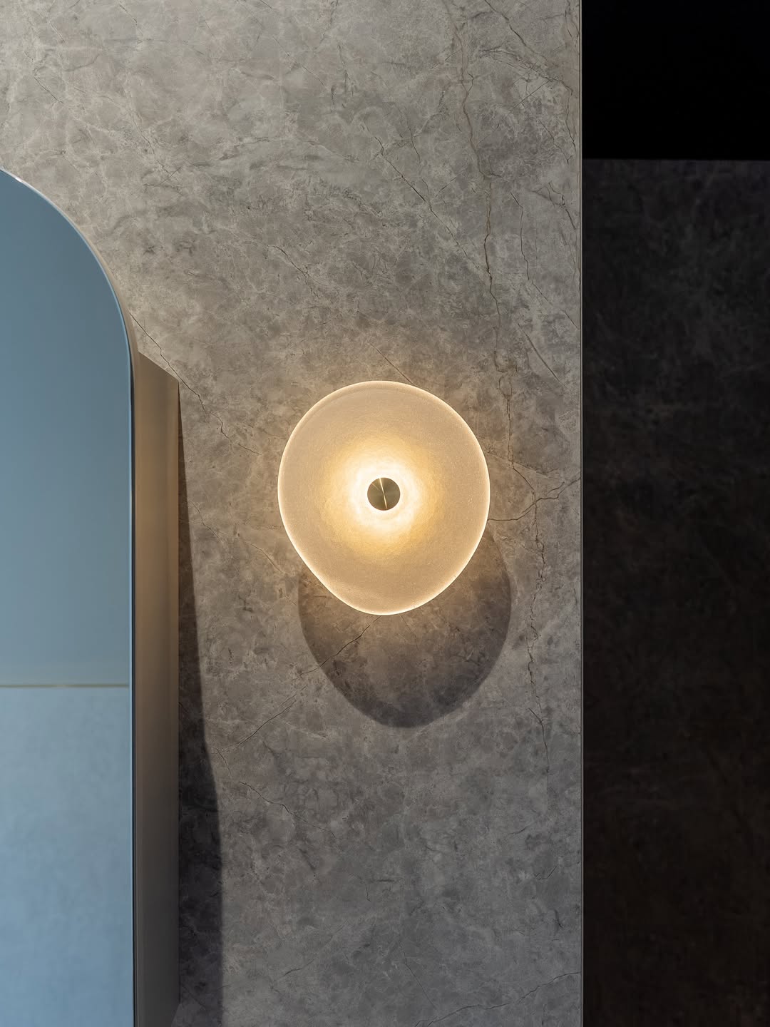 Wall light against the Italian feature-wall tile in the North Street bathroom